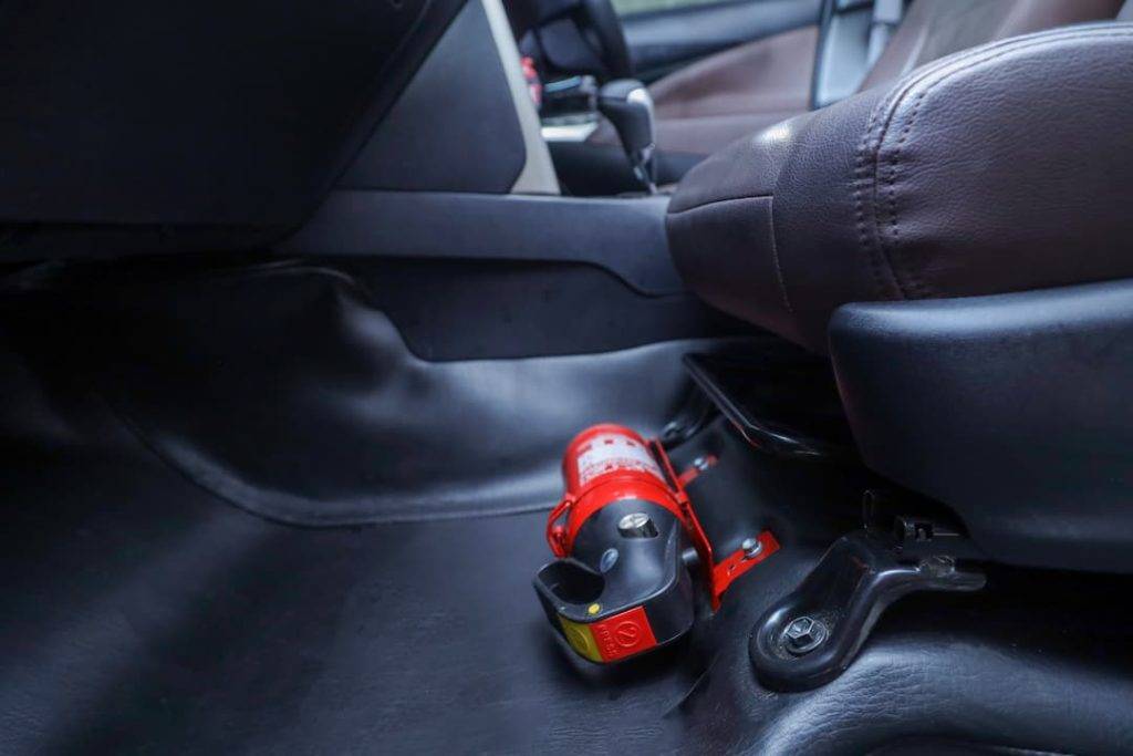 Fire Extinguisher In A Footwell