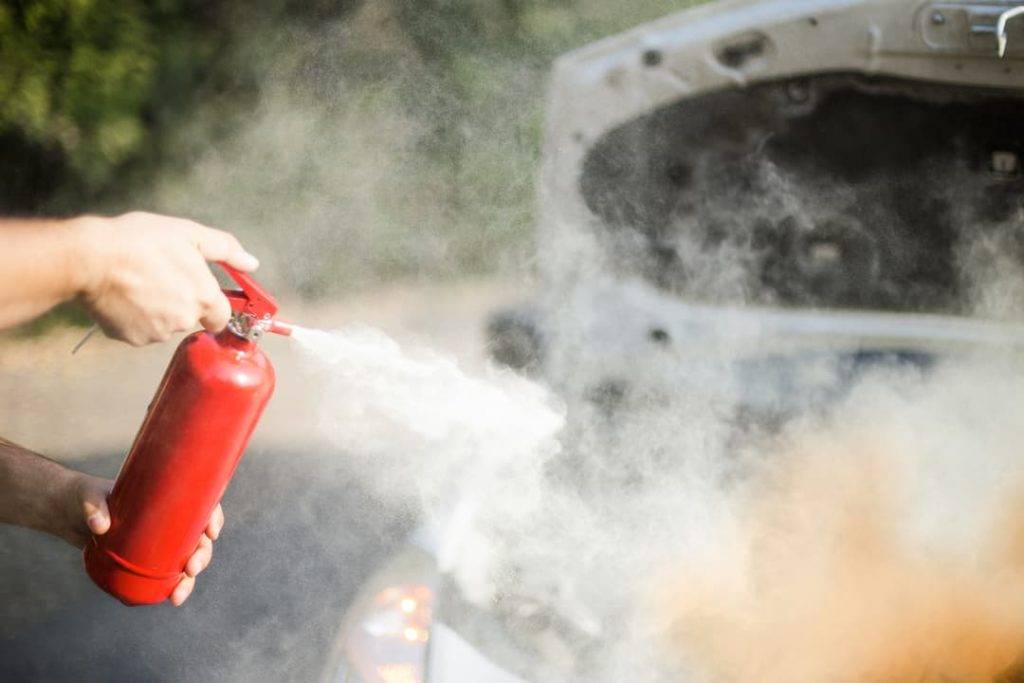 Using A Fire Extinguisher On A Car